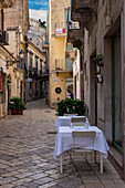 Outdoor Restaurant Seating on quaint narrow Street