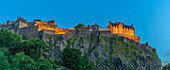 View of Edinburgh Castle from Princes Street at dusk, UNESCO World Heritage Site, Edinburgh, Scotland, United Kingdom, Europe
