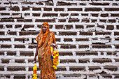 Indian Woman selling Malas (flower garlands), Panjim City (Panaji), Goa, India, Asia