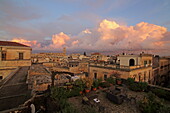 Roof terrace of the Palazzo Rollo and he view over the roofs of the old town of Lecce, Salento, Apulia, Italy
