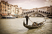 Gondola at the Rialto Bridge on the Grand Canal, Venice, Veneto, Italy