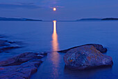 Canada, Ontario, Rossport. Moon over Lake Superior