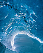 Ice cave in the glacier Breidamerkurjokull in Vatnajokull National Park. Entrance of the cave. Iceland