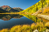USA, Colorado, San Juan Mountains. Crystal Lake reflection in autumn