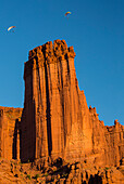 Powered Paragliders above and around Fisher Towers, Utah in evening light