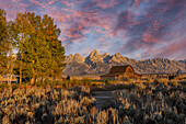 Moulton barn at sunrise and Teton Range, Grand Teton National Park, Wyoming