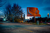 Martin Luther King, Jr. Sculpture, Homage to King, with Cityscape in background at dusk, Atlanta, Georgia, USA