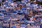 Africa, Morocco, Chefchaouen. Overview of town at twilight.