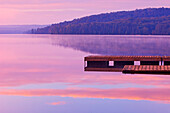 Canada, Ontario, Algonquin Provincial Park, Dock and fog on Lake of Two Rivers.