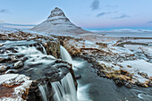Wintry waterfall below Kirkjufell aka Church Mountain on the Snaefellsnes Peninsula in western Iceland