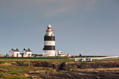 Ireland, County Wexford, Hook Peninsula, Hook Head, Hook Head LIghthouse, sunset