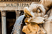 Italy, Rome. Piazza della Rotunda, Fontana del Pantheon, 1575, (supplied by Virgo (Vergine) Aqueduct with 4 carved marble dolphins with Pantheon facade as backdrop