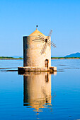 The spanish windmill on the lagoon of Orbetello, Orbetello, Grosseto province, Maremma, Tuscany, Italy