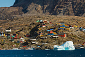 Greenland, Uummannaq. Colorful houses dot the rocky landscape.