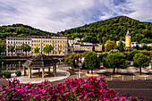 View from the terrace of the Kurhaus to the Römerquelle pavilion and historic buildings on the banks of the Lahn, Bad Ems, Rhineland-Palatinate, Germany