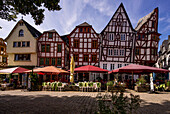 Gastronomy under half-timbered houses on Bischofsplatz, Limburg an der Lahn, Hesse; Germany