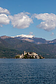 View over Lake Orta from the western shore to Isola San Giulio, Novara, Piedmont, Italy.