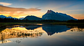Canada, Alberta, Banff, Vermillion Lakes, Mount Rundle sunrise reflection.