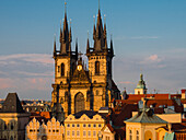 Czech Republic, Prague. Tyn Church, founded in 1385, dominates one side of the Old Town Square in Prague. The towers of this powerful looking Gothic church (with a Baroque interior) can be seen from all over Prague.