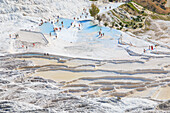 Southwestern Turkey, Denizli Province, River Menderes valley, Pamukkale, 'cotton castle' a natural site of hot springs and travertines, terraces of carbonate minerals.