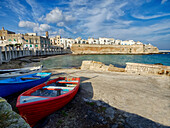 Colorful boats on the beach.