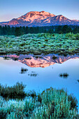 USA, California, Sierra Nevada Range. Mammoth Mountain reflects in Mammoth Creek