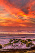 USA, Oregon, Florence. Sunset on beach
