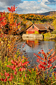 USA, Vermont, Moscow, mill on Little River pond there, fall foliage