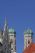 Towers of the Frauenkirche with the gable of the north facade of the New Town Hall, Munich, Upper Bavaria, Bavaria, Germany
