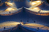 The setting sun reflects on the roof of the Olympic Stadium, Munich, Upper Bavaria, Bavaria, Germany