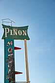 OldPinon Motel neon sign along former Route 66 in Albuquerque, New Mexico