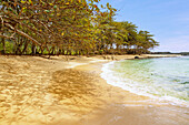 Sandy beach Praia Piscina in the south of the island of São Tomé in West Africa