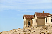 Namibia; Karas region; Southern Namibia; Tsau Khaeb National Park; Kolmannskop; former mining settlement and diamond mining capital; abandoned doctor's house;