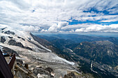 View from Aiguille du Midi over the glacier tongue of the Bessons Glacier to the Vallée de Chamonix-Mont-Blanc, Le Mont-Blanc, Bonneville, Haute-Savoie, Auvergne-Rhône-Alpes, France