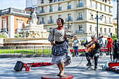 Flamenco dancer at the Puerta de Jerez in Seville, Andalusia, Spain