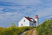 Canada, Quebec, Mingan Archipelago National Park Reserve. Lighthouse on I^le aux Perroquets