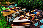 Old wooden boats in Killarney National Park, Ireland