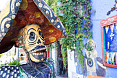 Cabo San Lucas, Mexico. Weathered Dia de los Muertos sculpture.