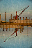 Doubl exposure of a crane in the harbour area of Ghent, Belgium.