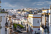 Street with white houses of Arcos de la Frontera, Andalusia, Spain