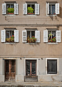 Facade of houses in Muggia, Friuli Venezia Giulia, Italy.