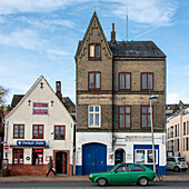 Historic residential buildings, green car, port area, Flensburg, Schleswig-Holstein, Germany