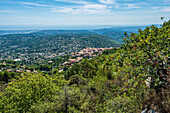 View from the Baou de Saint-Jeannet mountain on the hilltop village of Saint-Jeannet and the French Riviera, Provence, France