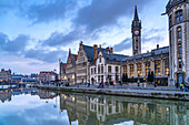 Medieval guild houses of the Graslei quay on the Leie river at dusk, Ghent, Belgium