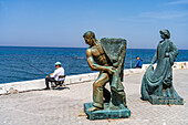 Sculpture fisherman on the promenade in Kyrenia or Girne, Turkish Republic of Northern Cyprus, Europe