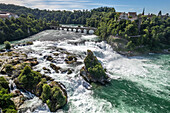 Rheinfall waterfall, Laufen Castle and Rheinfall Bridge near Neuhausen am Rheinfall, Switzerland, Europe