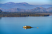Island with monastery ruins in Lake Skadar, Montenegro, Europe
