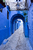 Morocco. A blue alley in the hill town of Chefchaouen.