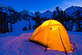 Yellow dome tent in winter, John Muir Wilderness, Sierra Nevada Mountains, California, USA