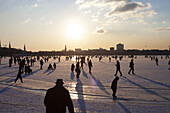 People on the ice, Binnenalster, Alster frozen over in winter, Hamburg, Germany